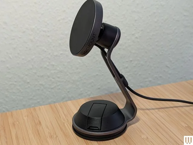 Image may contain Electrical Device Microphone Lamp and Furniture