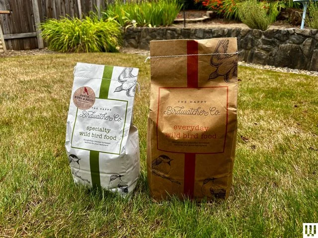 Image may contain: Grass, Plant, Bag, Box, Animal, Bird, Powder, Backyard, Nature, Outdoors, and Yard