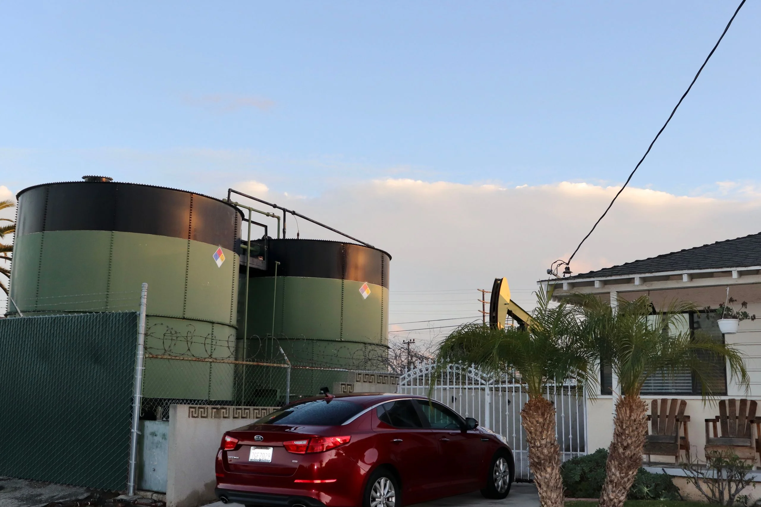 Image may contain Car Transportation Vehicle Architecture Building Factory Outdoors Machine and Wheel