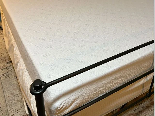 Image may contain: Furniture, Mattress, and Bed