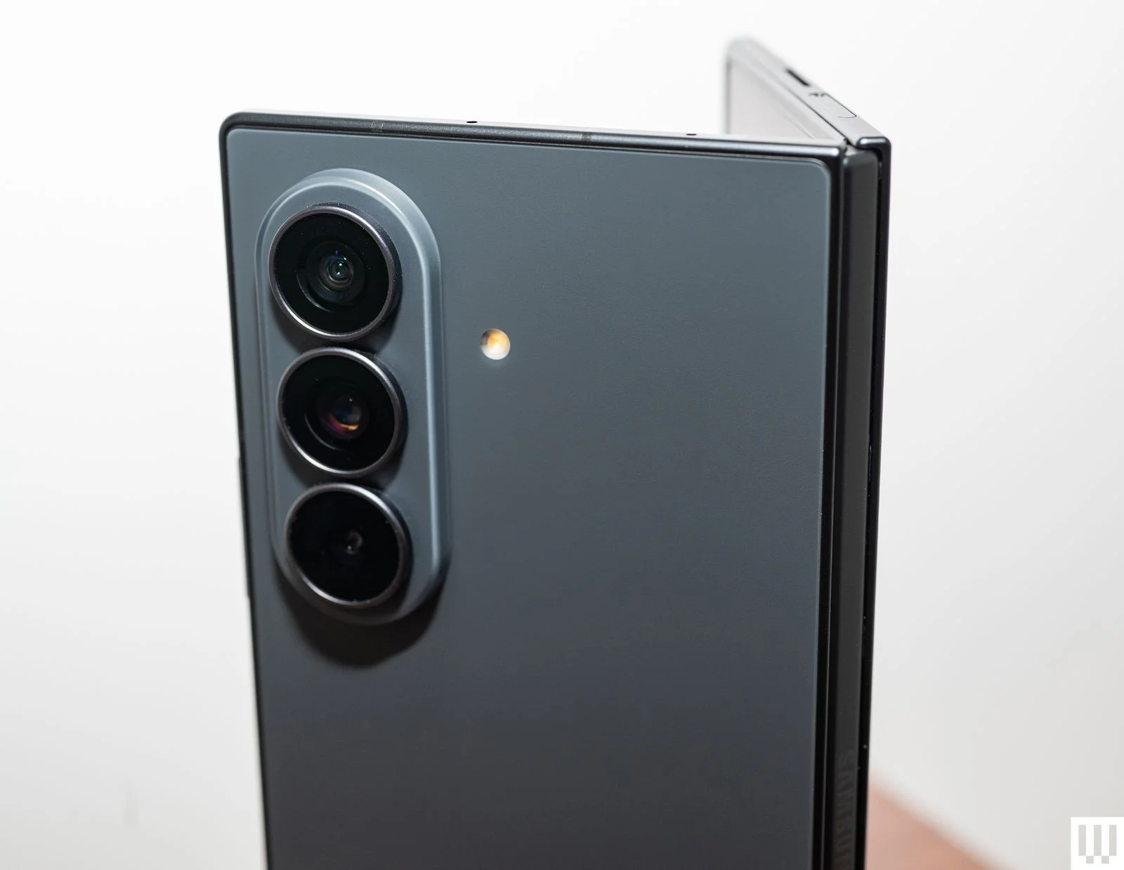 Image may contain Electronics Speaker and Camera