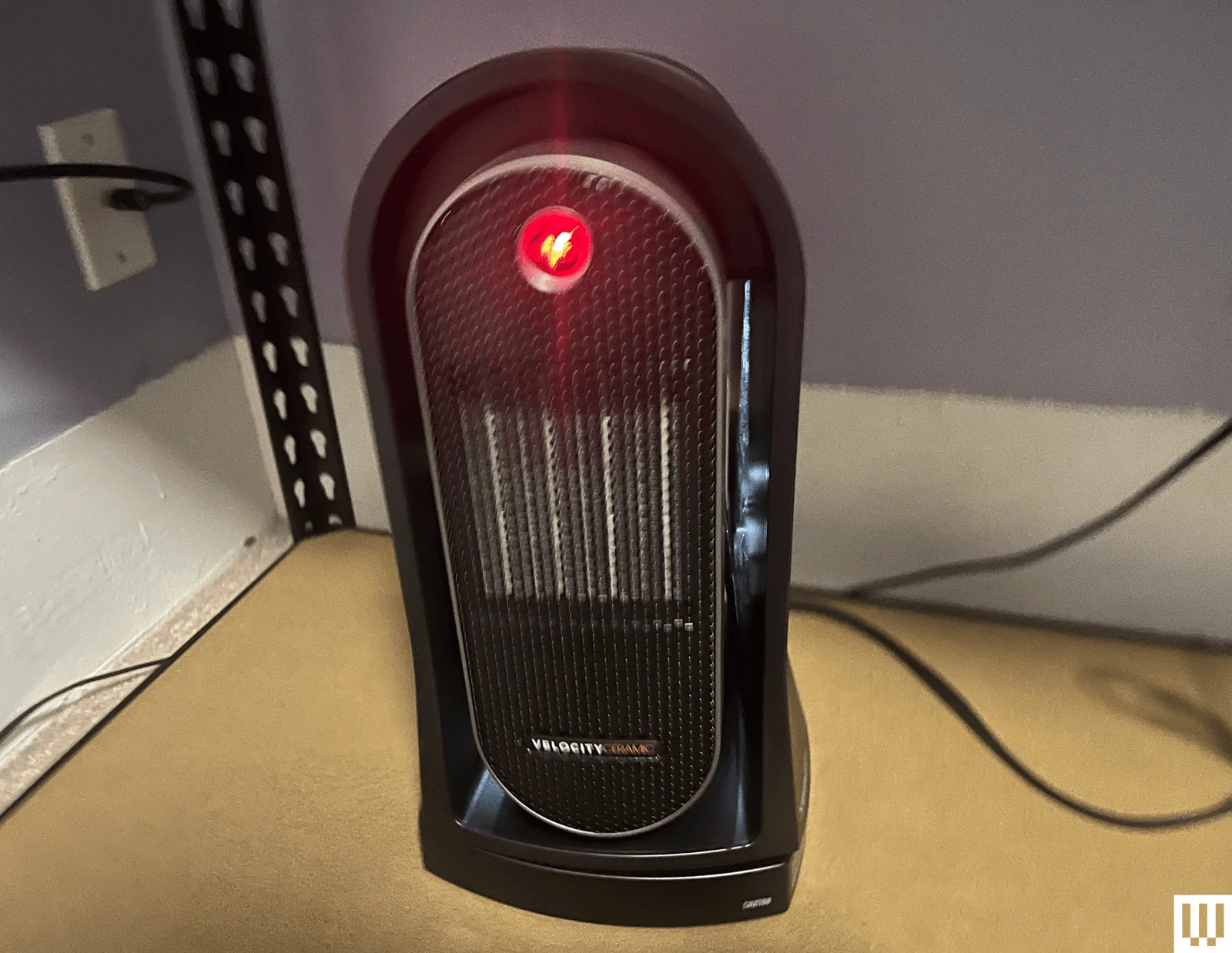 Image may contain Appliance Device Electrical Device Heater Light Traffic Light Electronics and Speaker