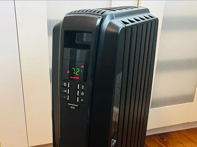 Space Heater Buying Guide DeLonghi Drago Brand Electrical Heater on wood floors