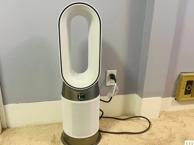 Oval shaped fan with a hole in the middle
