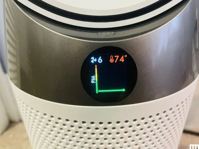 Closeup of the digital screen on a silver surface
