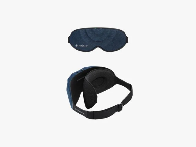Therabody Sleep Mask shown from the front and the side, including the strap and additional layer