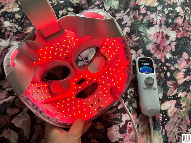 Image may contain: Baby, Person, Electronics, Phone, Mobile Phone, and Helmet